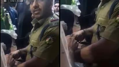 പൂക്കള്ക്കിടയില് പെരുമ്പാമ്പ്; പാമ്പു പിടുത്തക്കാരനായി സ്ഥലം എസ്ഐ, ചാക്കിലാക്കി വനം വകുപ്പിന് കൈമാറി