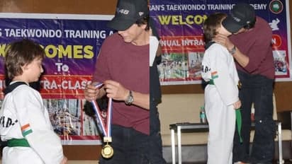 തായ്കൊണ്ടോ മത്സരത്തിൽ വിജയിയായി അബ്രഹാം, മകന് സ്നേഹ ചുംബനവുമായി ഷാരൂഖ്