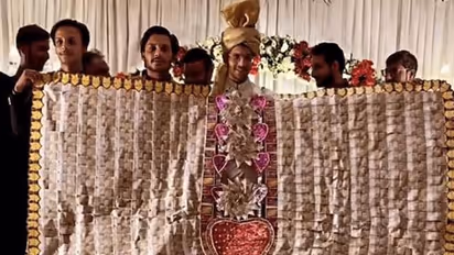 വിവാഹദിനത്തില് വരന് എത്തിയത് പടുകൂറ്റന് നോട്ടുമാല അണിഞ്ഞ്; അന്തംവിട്ട് വധു!