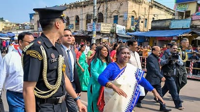 President Droupadi Murmu walks during her visit to Jagannath Temple in Puri
