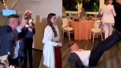 വിവാഹാഘോഷത്തിനിടെ കേക്ക് നശിപ്പിച്ച് അതിഥി, മുഖത്ത് ഇടിച്ച് വരൻ, വീഡിയോ വൈറൽ