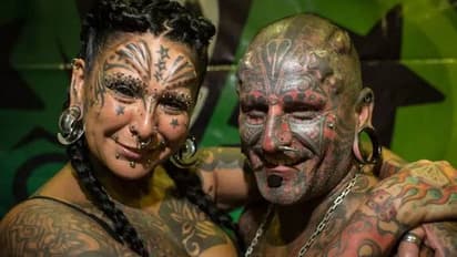 ശരീരത്തിൽ നൂറോളം 'മോഡിഫിക്കേഷൻസ്'; ലോക റെക്കോർഡ് സ്വന്തമാക്കി ദമ്പതികൾ