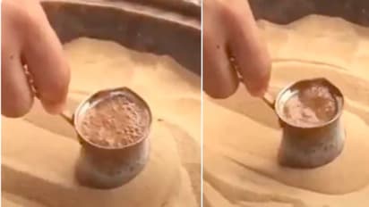 ചുട്ടുപഴുത്ത മണ്ണിന് മുകളില്‍ തിളച്ച് പൊങ്ങുന്ന കോഫി; വൈറലായി വീഡിയോ 