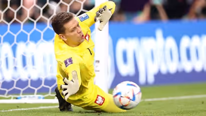 Szczesny is new Ochoa! Fans stunned after Poland goalie saves Saudi Arabia star Al-Dawsari's World Cup penalty