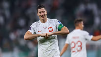 Fans go berserk after Poland star Robert Lewandowski breaks World Cup curse with goal against Saudi Arabia
