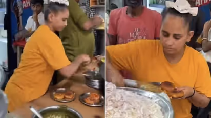 വേഷം കൊണ്ട് ശ്രദ്ധിക്കപ്പെട്ട് വഴിയോട കച്ചവടക്കാരി ; വൈറലായി വീഡിയോ...