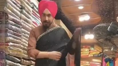 സ്ത്രീകള്ക്ക് കഴിയുമോ ഇങ്ങനെ സാരിയുടുക്കാൻ; വീഡിയോ...