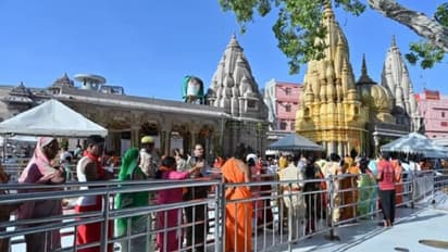 Flower shower for Naga Sadhus, Saints, and devotees at Kashi Vishwanath Dham amidst vibrant festivities