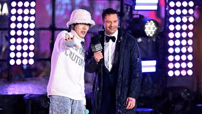 Video and Pictures: BTS' J-Hope performs at Times Square on New Year's eve in the rain