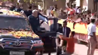 Hubballi roadshow: PM Modi accepts garland from youth who breached security cordon