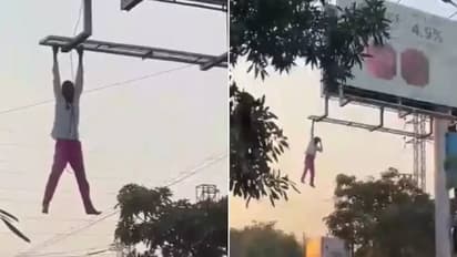 മദ്യപിച്ച് ലക്കുകെട്ട് ബിൽബോർഡിൽ വലിഞ്ഞു കയറി പരാക്രമം, പിന്നെ സംഭവിച്ചത്...