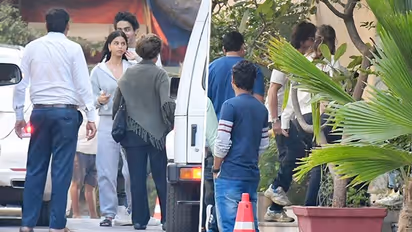 Spotted: Shah Rukh Khan snapped with his entire family at the Pathaan screening - PHOTOS