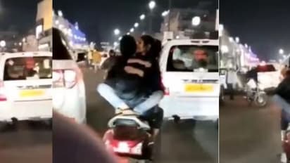 రోడ్డుమీద స్కూటీపై లవర్స్ పాడు పని! వీడియో వైరల్ .. రంగంలోకి దిగిన లక్నో పోలీసులు..