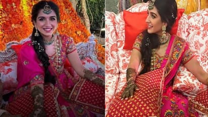 जानें क्यों स्पेशल है अंबानी की छोटी बहू राधिका मर्चेंट का मेहंदी वाला लहंगा, देखें इनसाइड PHOTOS