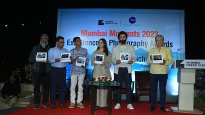 Ranbir Kapoor, Alia Bhatt at Mumbai Press Club, pose in front of  a wall full of their beautiful photos