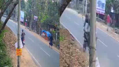 கவனக்குறைவாக குழந்தையுடன் சாலையை கடந்த பெண் விபத்தில் தூக்கி வீசப்பட்ட காட்சி