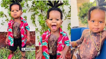 കുഞ്ഞു ശരീരം നിറയെ ടാറ്റൂവും സ്വര്ണാഭരണങ്ങളും; അമ്മയ്ക്കെതിരെ വ്യാപക വിമര്ശനം