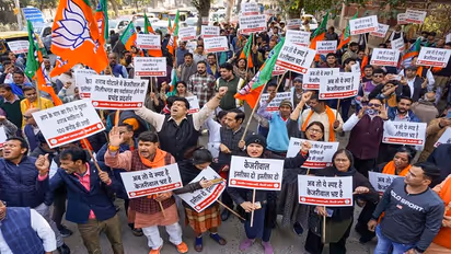 Delhi liquor scam: BJP workers stage protest outside AAP office against CM Arvind Kejriwal
