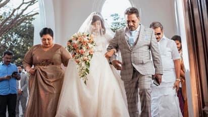 வெள்ளை நிற வெட்டிங் கவுனில் தேவதை போல் இருக்கும் கருணாஸ் மகள் டயானா..! வெளியான திருமண போட்டோஸ்..!