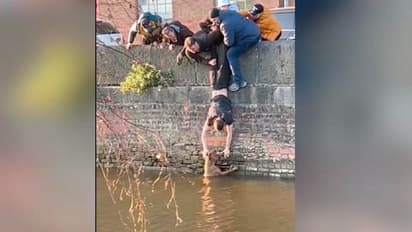 ప్రాణాలకు తెగించి కుక్కను కాపాడిన విద్యార్థులు.. వీడియో వైరల్...!