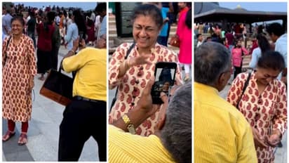 Viral Video:  ആള്‍ത്തിരക്കിനിടയില്‍ ഭാര്യയുടെ ചിത്രമെടുക്കാന്‍ ശ്രമിക്കുന്ന ഭര്‍ത്താവ്; വൈറലായി ഒരു വീഡിയോ 