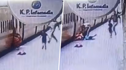 UP police saves woman, child who slipped while deboarding moving train in Kanpur; watch video