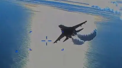 VIDEO: US releases footage of Russian SU-27 fighter jet dumping fuel on downed MQ-9 drone