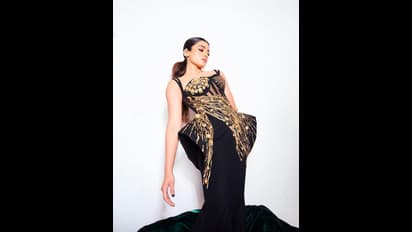 ಗೋಲ್ಡನ್ ಬ್ಲ್ಯಾಕ್ ಗೌನ್‌ನಲ್ಲಿ ರಶ್ಮಿಕಾ ಮಿಂಚಿಂಗ್; ಹೇಗಿದೆ ನೋಡಿ ಪುಷ್ಪ ನಟಿಯ ಹೊಸ ಲುಕ್ 