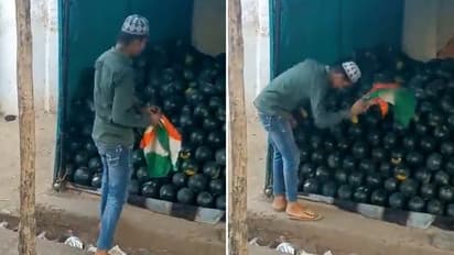 WATCH: Man shamelessly uses Indian national flag to clean fruits in Jhansi, UP Police order probe