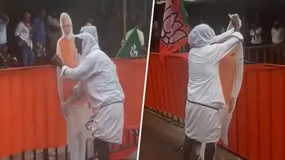 Karnataka Election 2023: Modi is God, says Devanahalli villager seen cleaning PM's cut out amid downpour