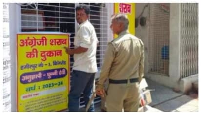 കൈയിൽ വിലങ്ങുമായി പ്രതി മദ്യഷോപ്പിൽ, കാവലിന് പൊലീസ്; അന്വേഷണം പ്രഖ്യാപിച്ച് സർക്കാർ