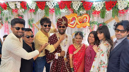 ಬಾಡಿಗಾರ್ಡ್ ಮದ್ವೆಲಿ ಕಾರ್ತಿಕ್ ಆರ್ಯನ್; ಮದುಮಗನ ಕುತ್ತಿಗೆ ಹಿಡಿದು ಪೋಸ್ ನೀಡಿದ ಸ್ಟಾರ್, ಫ್ಯಾನ್ಸ್ ಹೇಳಿದ್ದೇನು?