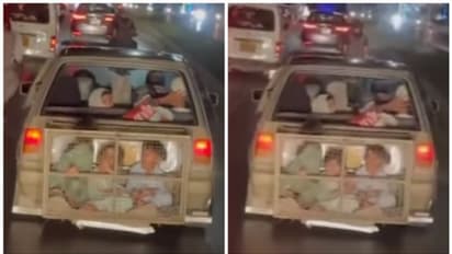 കാറിന് പിന്നില്‍ പ്രത്യേക ഇരുമ്പ് കൂട്ടില്‍ കുട്ടികളുമൊത്തുള്ള യാത്ര; നടപടി ആവശ്യപ്പെട്ട് നെറ്റിസണ്‍സ്