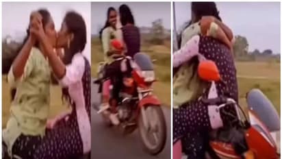 ഓടുന്ന ബൈക്കിൽ, ഹാൻഡിലിൽ നിന്ന് കൈവിട്ട് ലിപ് ലോക്ക് ചുംബനവുമായി യുവതികളുടെ അഭ്യാസം; വീഡിയോ വൈറൽ