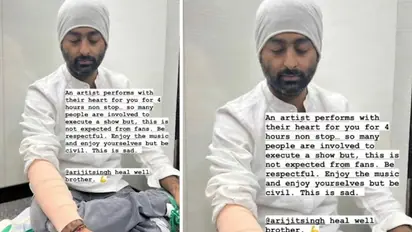 Arijit Singh schools aggressive fan who injured his hand by pulling it mid-concert - WATCH