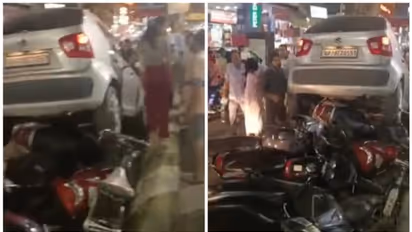 ఆమె డ్రైవింగ్కు బైక్లన్నీ తుక్కు! పార్క్ చేసిన బైక్లపైకి కారు ఎక్కించిన మహిళ!! (Video)