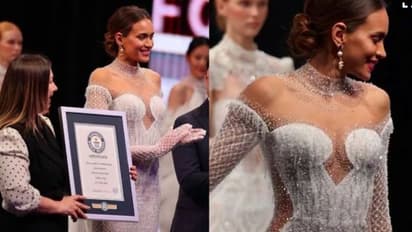 200 മണിക്കൂറെടുത്ത് തുന്നിപ്പിടിപ്പിച്ചത് അര ലക്ഷം ക്രിസ്റ്റലുകള്; വിവാഹ ഗൗണിന് ഗിന്നസ് റെക്കോര്ഡ്; വീഡിയോ