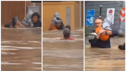 പ്രളയജലത്തില്‍ നിന്നും കുഞ്ഞിനെ രക്ഷപ്പെടുത്താന്‍ നിലവിളിച്ച് ഒരമ്മ; രക്ഷാപ്രവര്‍ത്തനത്തിന്‍റെ വീഡിയോ വൈറല്‍ 