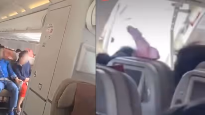 WATCH: Dramatic video shows passengers of Asiana Airlines plane terrified as man opens emergency door midair