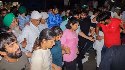 Wrestlers return without immersing medals in Ganga; Kejriwal says 'PM should shed arrogance'