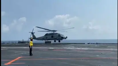 HISTORIC! MH 60R makes maiden landing onboard indigenous aircraft carrier INS Vikrant: WATCH