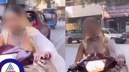 ಹೆಲ್ಮೆಟ್ ಇಲ್ದೆ ಸ್ಕೂಟಿ ಓಡಿಸಿದ ವಧು; ವಿಡಿಯೋ ವೈರಲ್, ಪೊಲೀಸರಿಂದ ಫೈನ್!