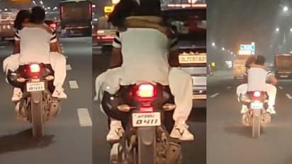 కదులుతున్న బైక్‌పై ప్రేమ జంట రొమాన్స్.. వీడియో వైరల్.. పోలీసులేం చేశారంటే...(వీడియో)