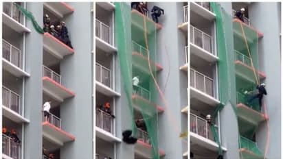 കെട്ടിടത്തിൽ നിന്നും താഴേക്ക് ചാടാൻ ശ്രമിക്കുന്ന സ്ത്രീയെ, രക്ഷിക്കാന് ശ്രമിക്കുന്ന വീഡിയോ വൈറല് !