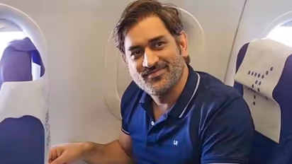 MS Dhoni spotted playing 'Candy Crush' during Economy Class Flight, Video goes Viral