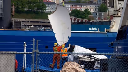 PHOTOS: First look of imploded Titanic submersible as ship carrying debris docks in Canada
