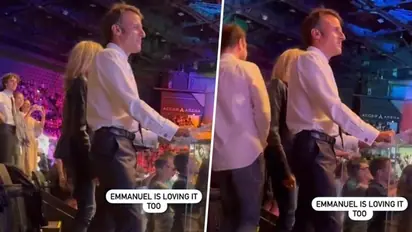 Emmanuel Macron under fire after being spotted at Elton John’s concert amid violent protests (WATCH)