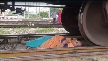 పట్టాలపై స్పృహతప్పి పడిపోయిన మహిళ.. అంతలోనే దూసుకొచ్చిన రైలు.. లక్కీగా..