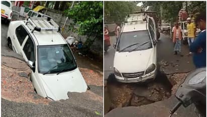 കനത്ത മഴ, പൊടുന്നനെ റോഡിന് നടുവിൽ വമ്പൻ ഗർത്തം; കാറിന്‍റെ പാതിയും കുഴിയിൽ പൂണ്ടു, രക്ഷപ്പെട്ട് ഡ്രൈവർ; വീഡിയോ