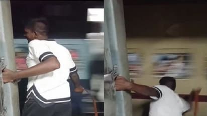 కదులుతున్న ఒక రైలులో నుంచి.. మరో రైలులోని ప్రయాణికులను బెల్టుతో కొడుతున్న వ్యక్తి...వీడియో వైరల్..